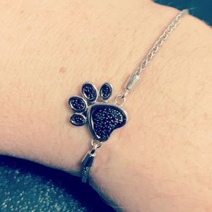 Kay’s black diamond paw bracelet